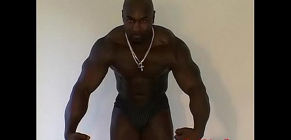  Muscular Ebony hunk Dynamite shows off his muscles and feet